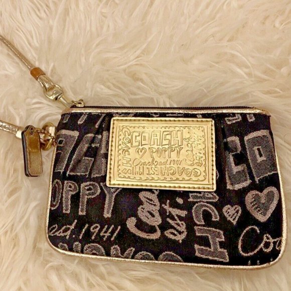 Coach Handbags - Y2K COACH POPPY BLACK METALLIC GOLD GRAFFITI WRISTLET BLACK GRAPHIC WALLET BAG